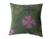 Green Indian suzani pillowcase 50x50 cm with hand-embroidered rosettes in pink blue leaves and brown-orange cord in boho vintage ethnic style